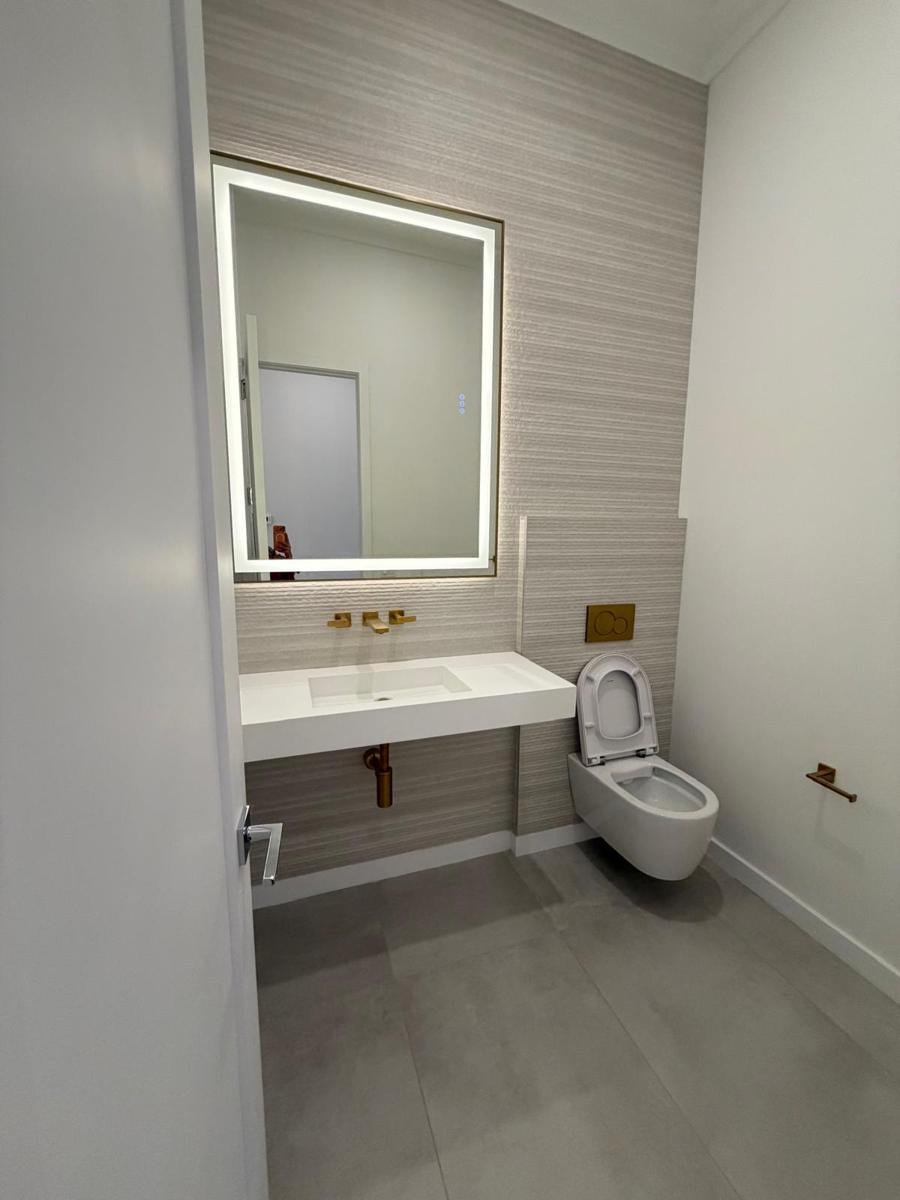 Powder room detailed after post-construction cleaning